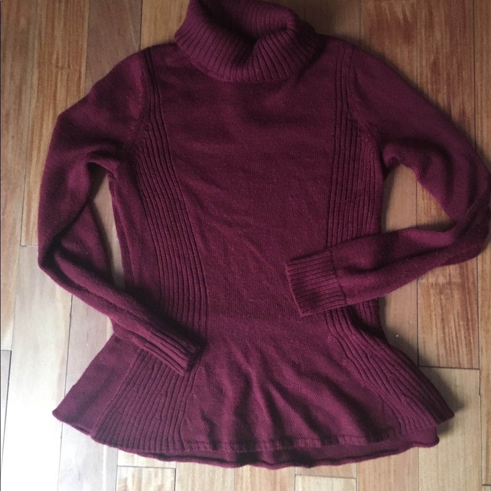 Limited peplum Turtleneck sweater